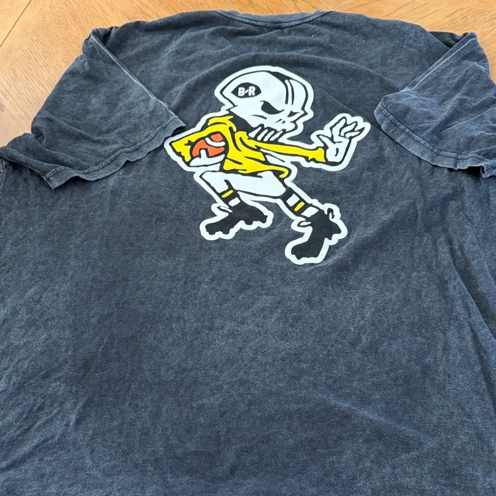 Black Men Gridiron T-Shirt with skeleton playing football as back hit  Logo - Picture 2 of 5